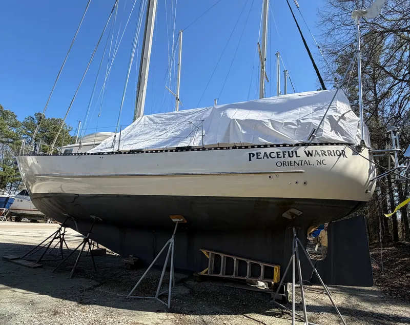 The Image of 1985 Benford 39 sailboat, Peaceful Warrior, on stands for maintenance. - 0