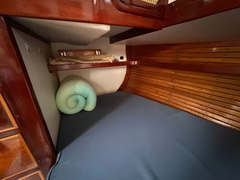 Slide: The Image of Interior of a 1985 Benford 39 yacht with wooden finish. - 15