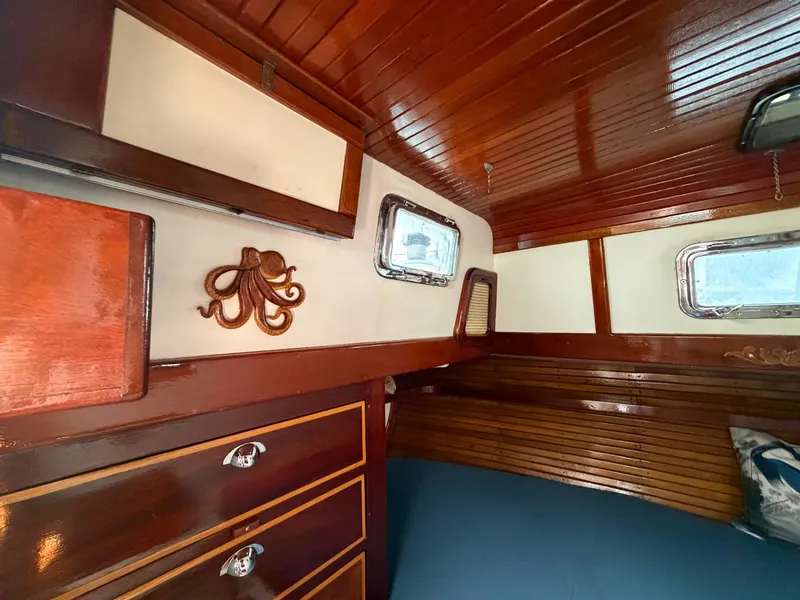 Slide: The Image of Interior of a 1985 Benford 39 yacht with wooden finish. - 18