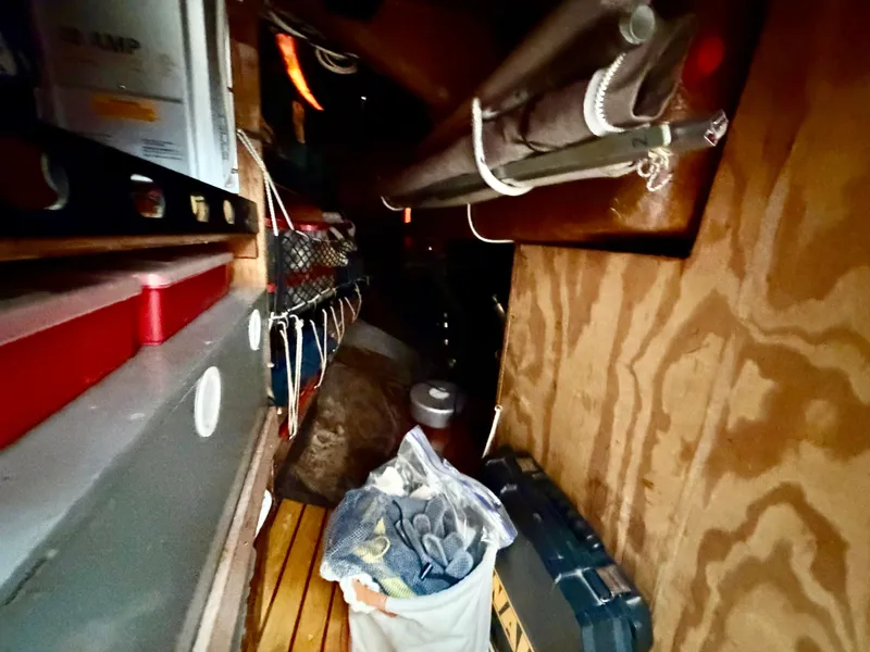 Slide: The Image of Interior of a 1985 Benford 39 boat with storage and equipment. - 25
