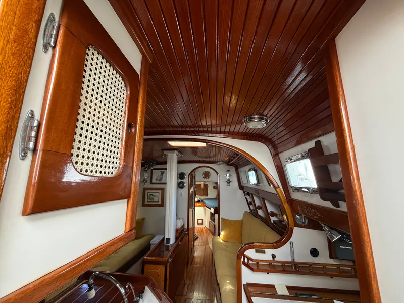 Slide: The Image of Interior of a 1985 Benford 39 yacht with wooden finish. - 27