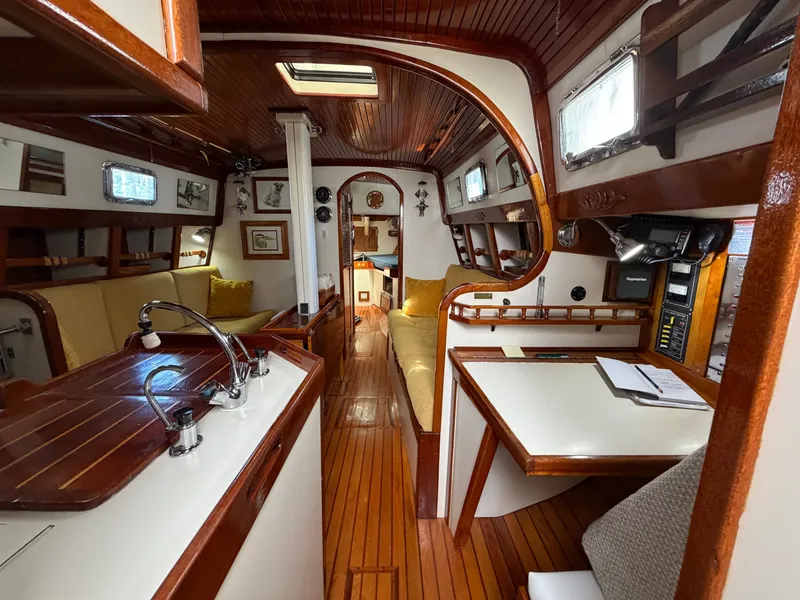 Slide: The Image of Interior of a 1985 Benford 39 yacht with wooden finish. - 28