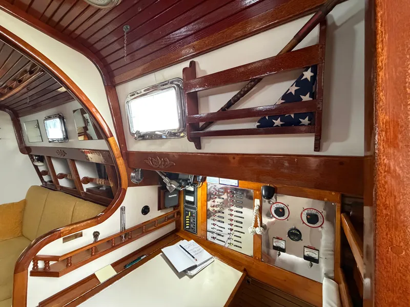 Slide: The Image of Interior of a 1985 Benford 39 yacht with wooden furnishings. - 30