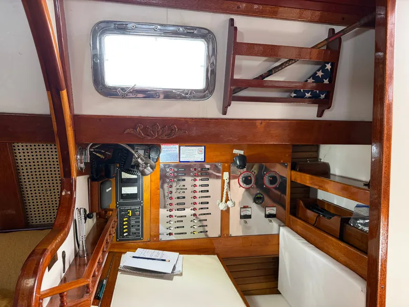 Slide: The Image of Interior of a 1985 Benford 39 with wood paneling and control panel. - 32
