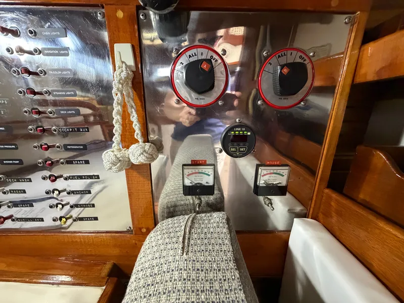 Slide: The Image of Benford 39 boat control panel with switches and gauges, year 1985. - 34