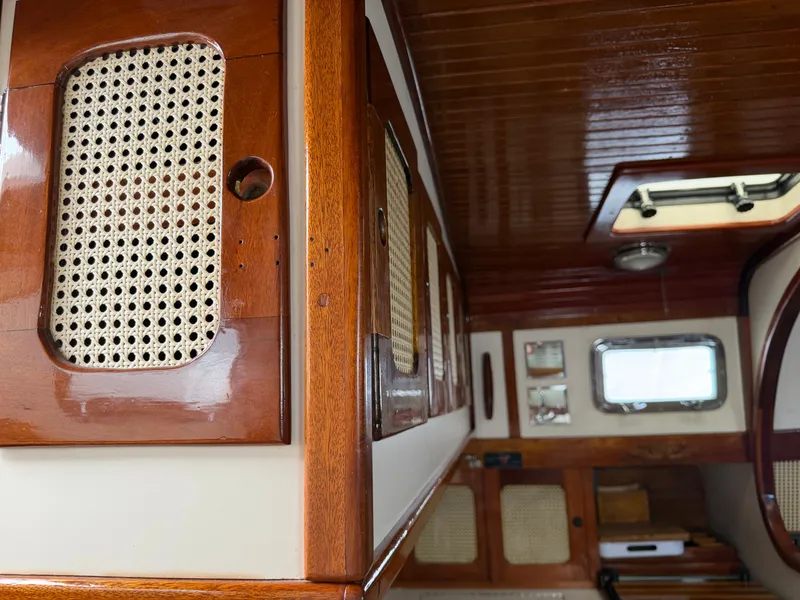 Slide: The Image of Interior of a 1985 Benford 39 boat with wooden finish. - 38
