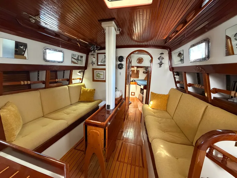 Slide: The Image of Interior of a 1985 Benford 39 yacht with wooden furnishings. - 39