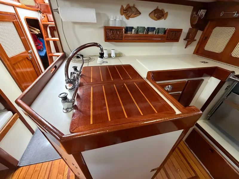 Slide: The Image of Interior of a 1985 Benford 39 yacht with wooden fittings. - 41