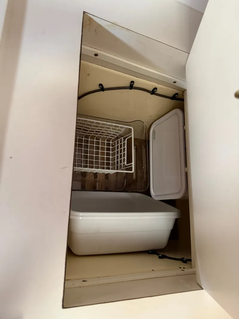 Slide: The Image of Interior of a 1985 Benford 39 with storage space. - 49