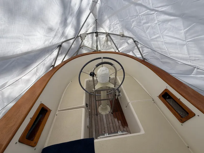 Slide: The Image of Interior view of a 1985 Benford 39 sailboat cockpit. - 5