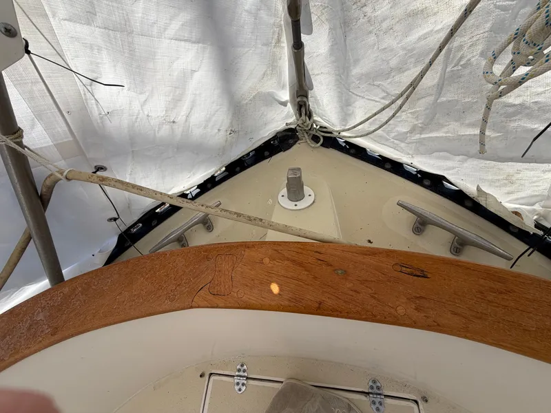 Slide: The Image of 1985 Benford 39 boat with wooden details and ropes. - 6