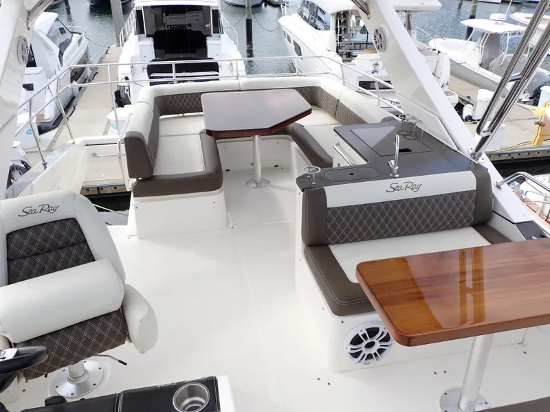 Slide: The Image of Luxurious 2015 Sea Ray 510 Fly yacht with spacious seating and elegant design. - 27