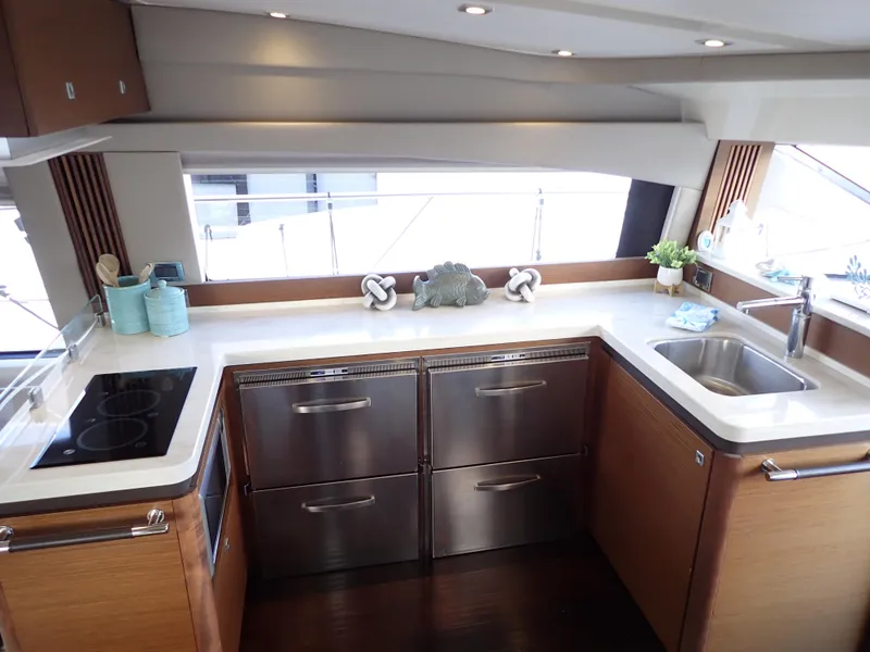Slide: The Image of Luxurious kitchen interior of 2015 Sea Ray 510 Fly yacht with modern appliances. - 34