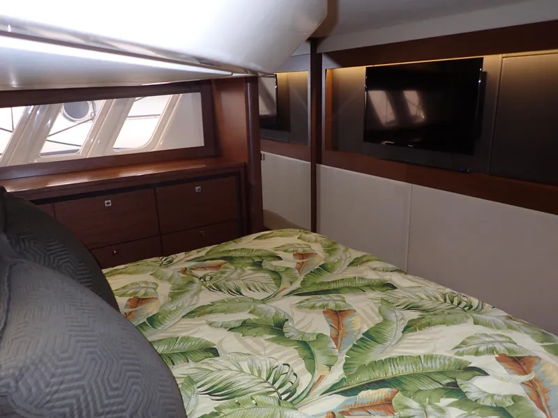 Slide: The Image of Luxurious cabin interior of 2015 Sea Ray 510 Fly yacht with tropical bedding. - 47