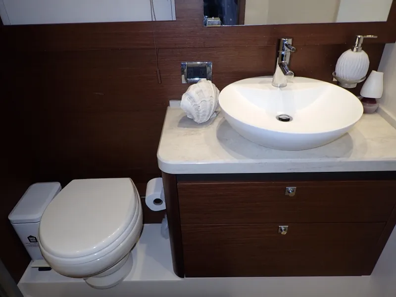 Slide: The Image of Luxurious bathroom on a 2015 Sea Ray 510 Fly yacht. - 49