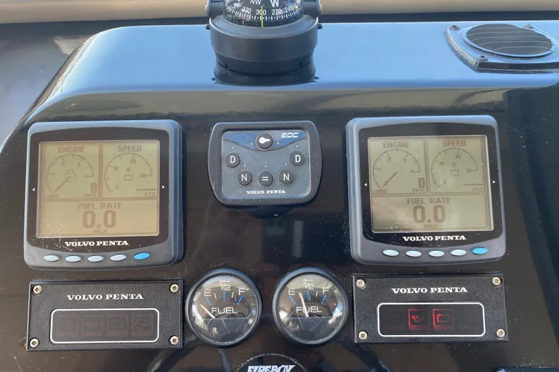 Slide: The Image of Control panel of a 2003 Zeta 36 boat with Volvo Penta displays and gauges. - 31