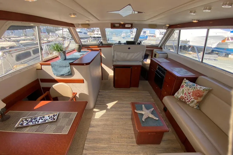 Slide: The Image of Luxurious interior of 2003 Zeta 36 yacht with elegant seating and decor. - 7