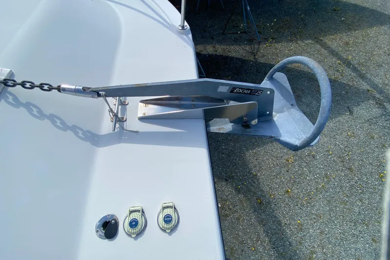 Slide: The Image of Bow of a 2003 Zeta 36 boat with anchor and chain mechanism. - 72