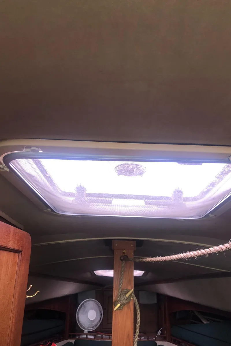 Slide: The Image of Interior view of 1980 Lancer 36 sailboat cabin with skylight. - 43