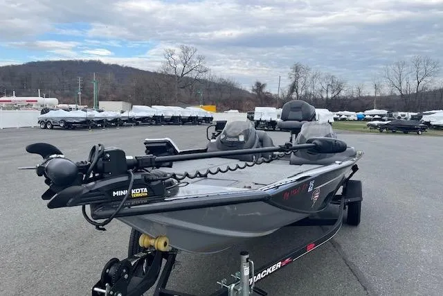 Slide: The Image of 2023 Tracker Pro Team 190 TX boat on trailer in outdoor lot. - 4