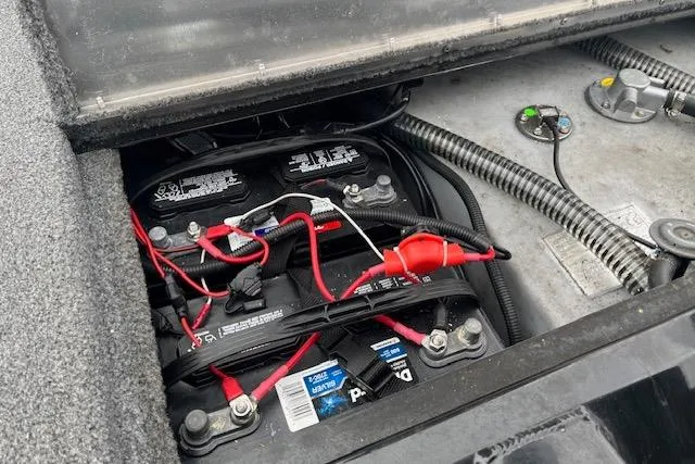 Slide: The Image of Battery compartment of 2023 Tracker Pro Team 190 TX boat with wiring and connections. - 5