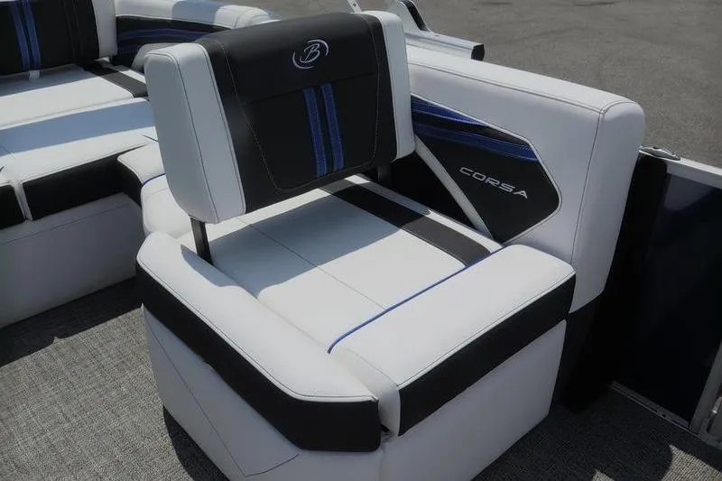 Slide: The Image of 2025 Barletta Corsa 23UC boat seating with black and blue accents. - 17