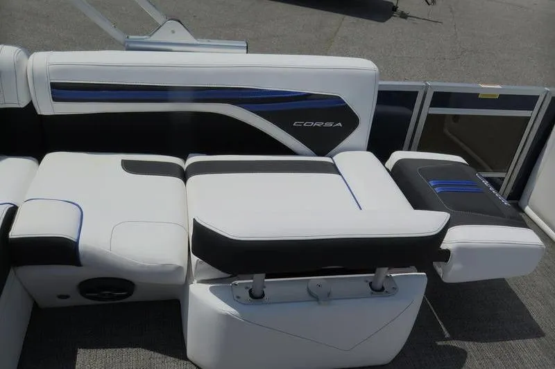 Slide: The Image of 2025 Barletta Corsa 23UC boat interior with stylish white and black seating. - 20