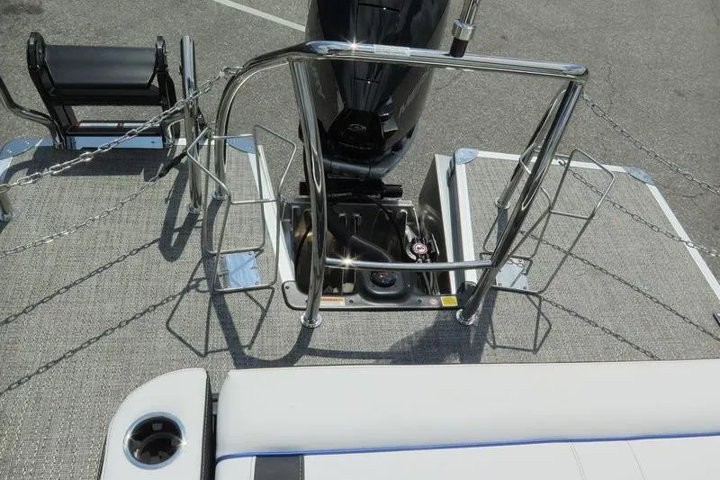 Slide: The Image of 2025 Barletta Corsa 23UC boat stern with motor and railing details. - 29