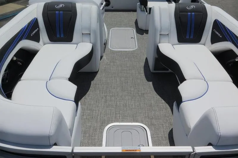 Slide: The Image of 2025 Barletta Corsa 23UC boat interior with luxurious seating and modern design. - 5