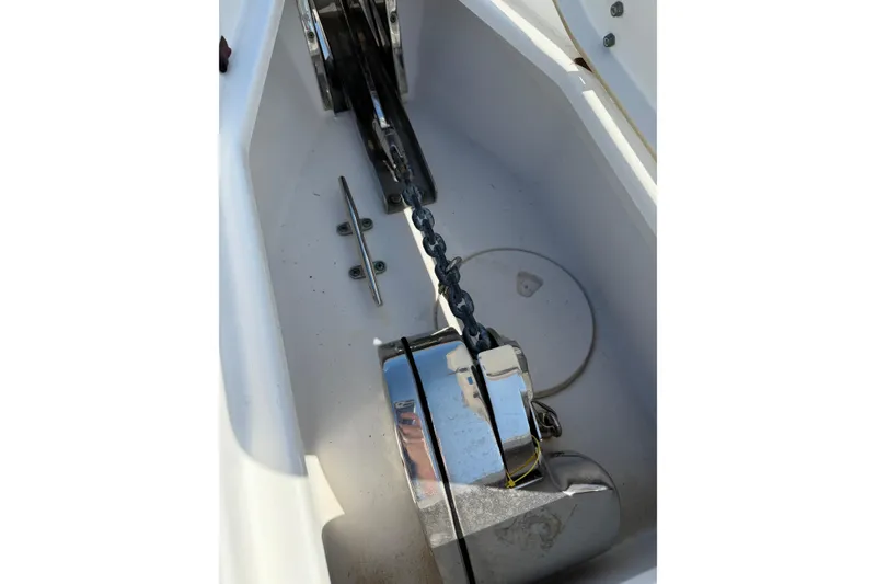 Slide: The Image of Anchor chain compartment of 2019 Sea Hunt Gamefish 27 boat. - 12