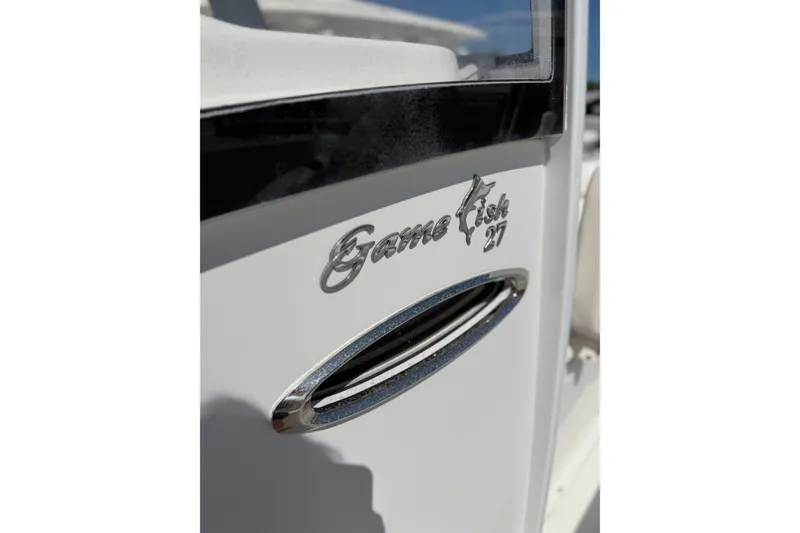 Slide: The Image of 2019 Sea Hunt Gamefish 27 boat emblem and design detail. - 14