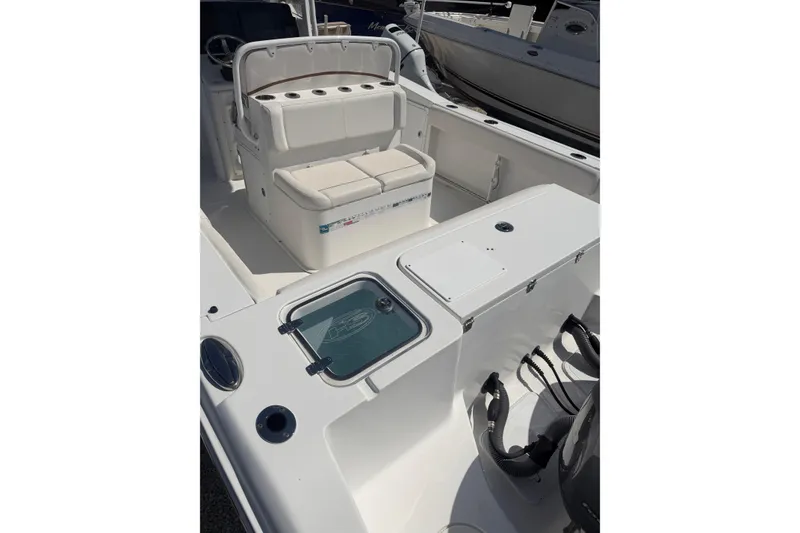 Slide: The Image of 2019 Sea Hunt Gamefish 27 boat interior with seating and storage compartments. - 4
