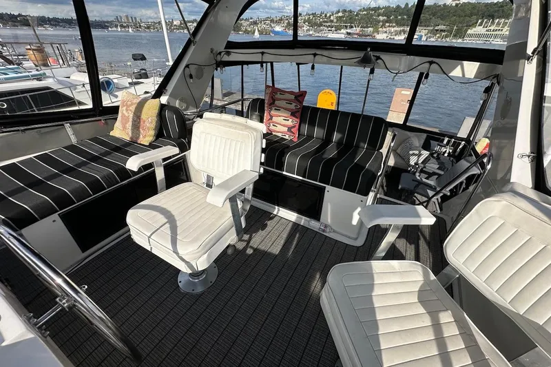 Slide: The Image of Interior of 1993 Ocean Alexander 460 yacht with seating and waterfront view. - 25