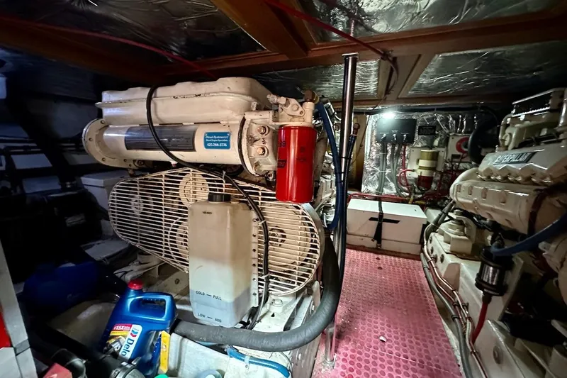Slide: The Image of Engine room of 1993 Ocean Alexander 460 yacht with machinery and equipment. - 63