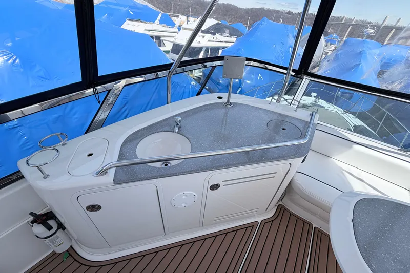 Slide: The Image of 2006 Sea Ray 52 Sedan Bridge yacht interior with sink and countertop. - 16