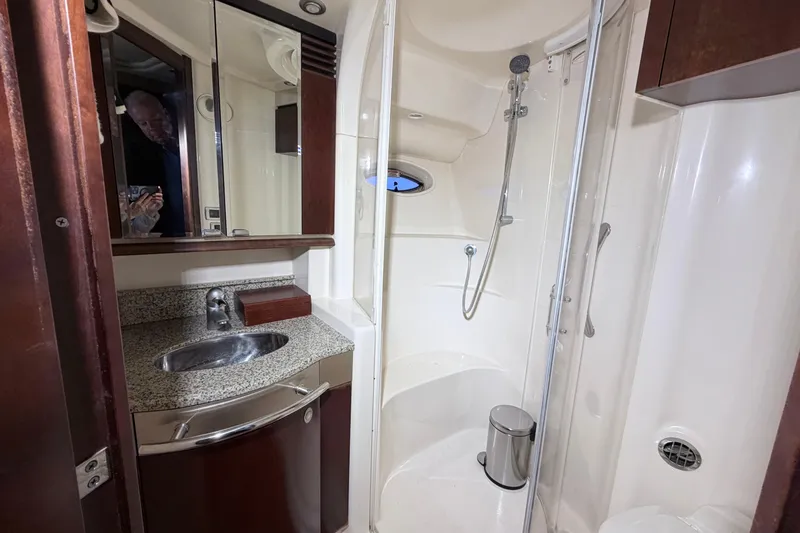 Slide: The Image of Luxurious bathroom in 2006 Sea Ray 52 Sedan Bridge yacht with modern fixtures. - 32