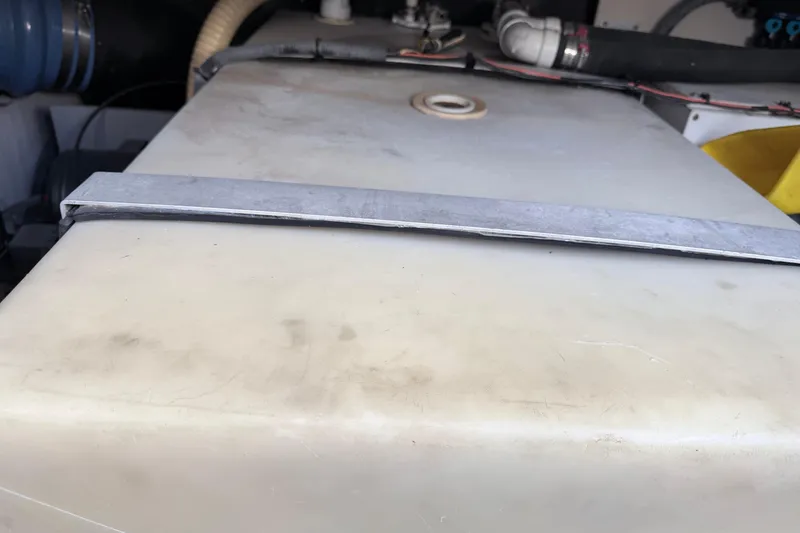 Slide: The Image of Engine compartment of a 2006 Sea Ray 52 Sedan Bridge yacht. - 48