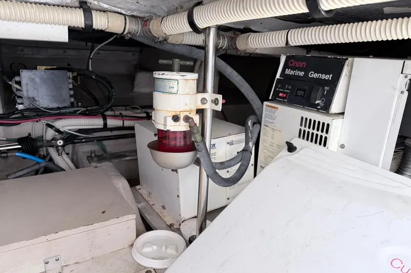 Slide: The Image of Engine room of 2006 Sea Ray 52 Sedan Bridge with Onan Marine Genset. - 50