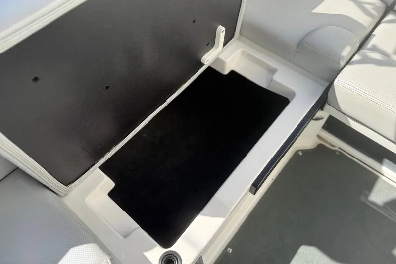 Slide: The Image of Storage compartment in 2020 MasterCraft NXT22 boat. - 23