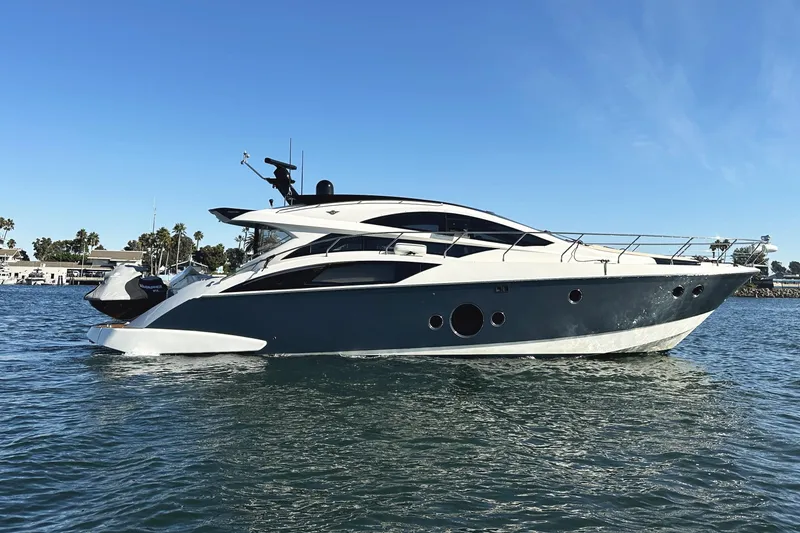 The Image of 2011 Marquis Sport Coupe yacht cruising on a sunny day. - 0