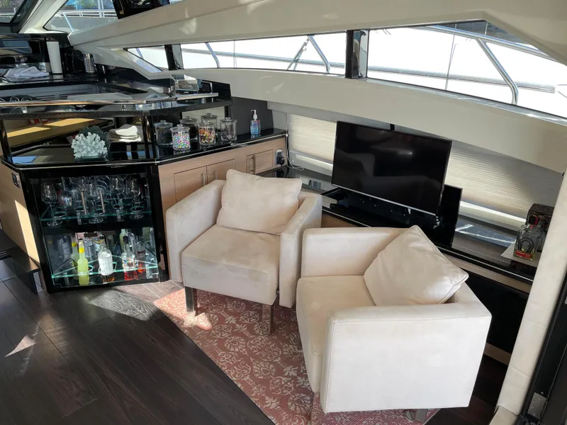 Slide: The Image of Luxurious interior of 2011 Marquis Sport Coupe yacht with plush seating and modern amenities. - 14