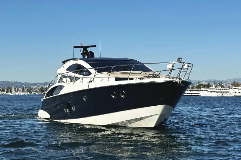 Slide: The Image of Luxury 2011 Marquis Sport Coupe yacht cruising on a sunny day. - 3