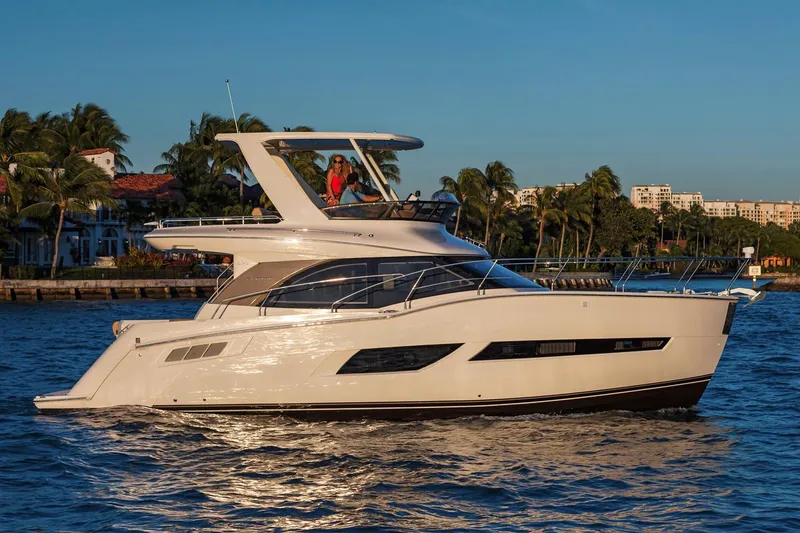 The Image of Manufacturer Provided Image: 2018 Carver 40 Command Bridge yacht cruising on a sunny day. - 0