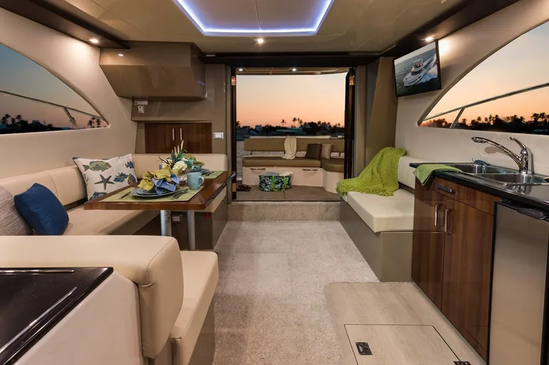 Slide: The Image of Manufacturer Provided Image: Luxurious interior of 2018 Carver 40 Command Bridge yacht at sunset. - 3