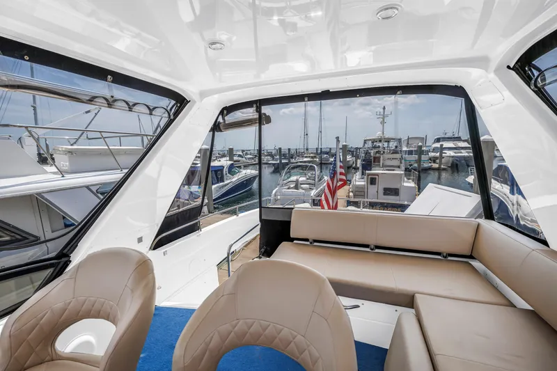 Slide: The Image of Interior view of 2018 Carver 40 Command Bridge yacht at marina. - 38