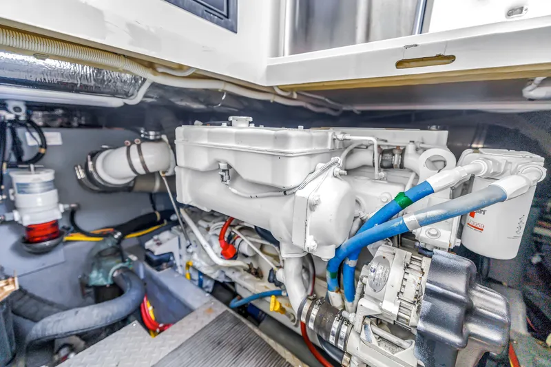 Slide: The Image of Engine room of 2018 Carver 40 Command Bridge, showcasing detailed mechanical components. - 43