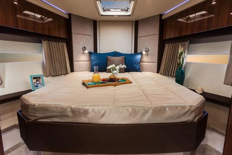 Slide: The Image of Manufacturer Provided Image: Luxurious bedroom interior of 2018 Carver 40 Command Bridge yacht with elegant decor. - 5