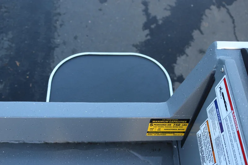 Slide: The Image of 2026 Alumaweld Adventurer 20 boat capacity label, showing maximum weight and passenger limits. - 15