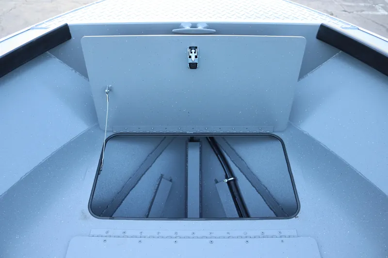 Slide: The Image of 2026 Alumaweld Adventurer 20 boat storage compartment with open hatch. - 19