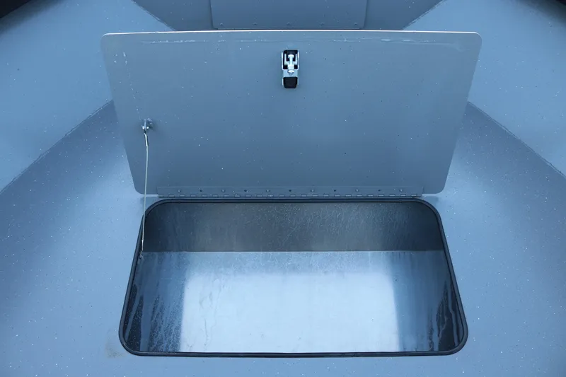 Slide: The Image of Open storage compartment on 2026 Alumaweld Adventurer 20 boat. - 20